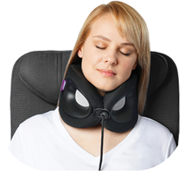 Woman comfortably wearing a Cabeau Evolution X neck pillow 